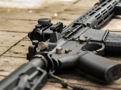 Convicted Felon Admits to Drug Trafficking and Possessing Assault Rifles